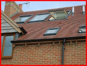 Clay Rosemary Roof Tiles with Fakro Roof Windows Installed