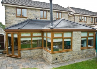 A Conservatory Conversion with an Insulated & Solid Tiled Roof System