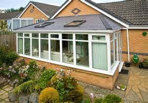 A Conservatory renovation with a Tiled roof in Tapco Slate
